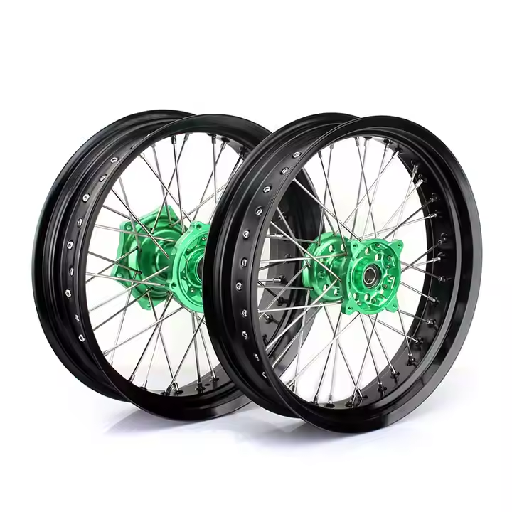 Custom green hub laced motorcycle wheels with black rims and stainless steel spokes, ideal for Suzuki dual-sport or enduro models.