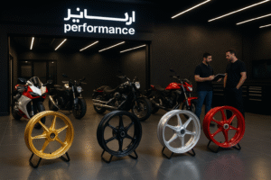 Forged motorcycle wheels displayed in a Dubai performance garage