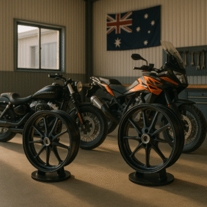 Forged motorcycle wheels on display in a custom Sydney garage with Harley and KTM bikes