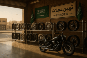 Forged motorcycle wheels displayed in a Riyadh custom garage