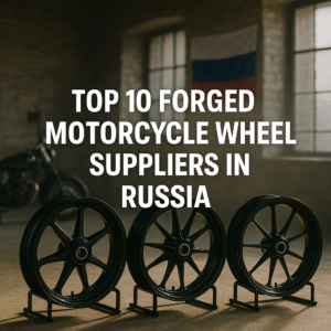 Forged motorcycle wheels displayed in a Russian workshop with flag backdrop and industrial lighting