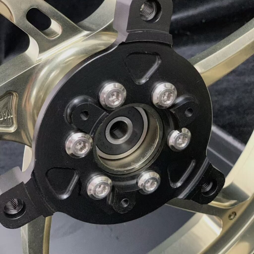 Complete set of forged gold wheels for Yamaha NVX155 with bearing and flange details on black background