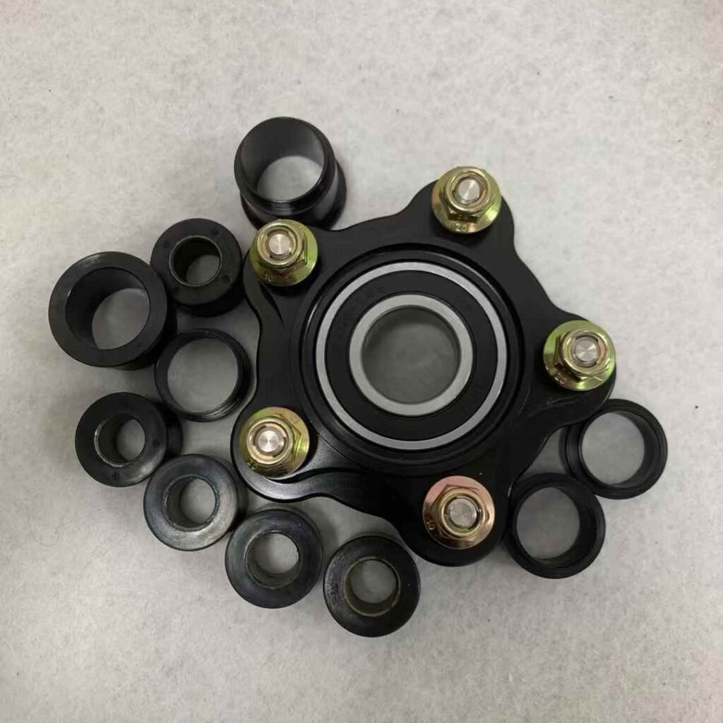 Full forged wheel accessory kit including spacers, nuts, and bearing assembly