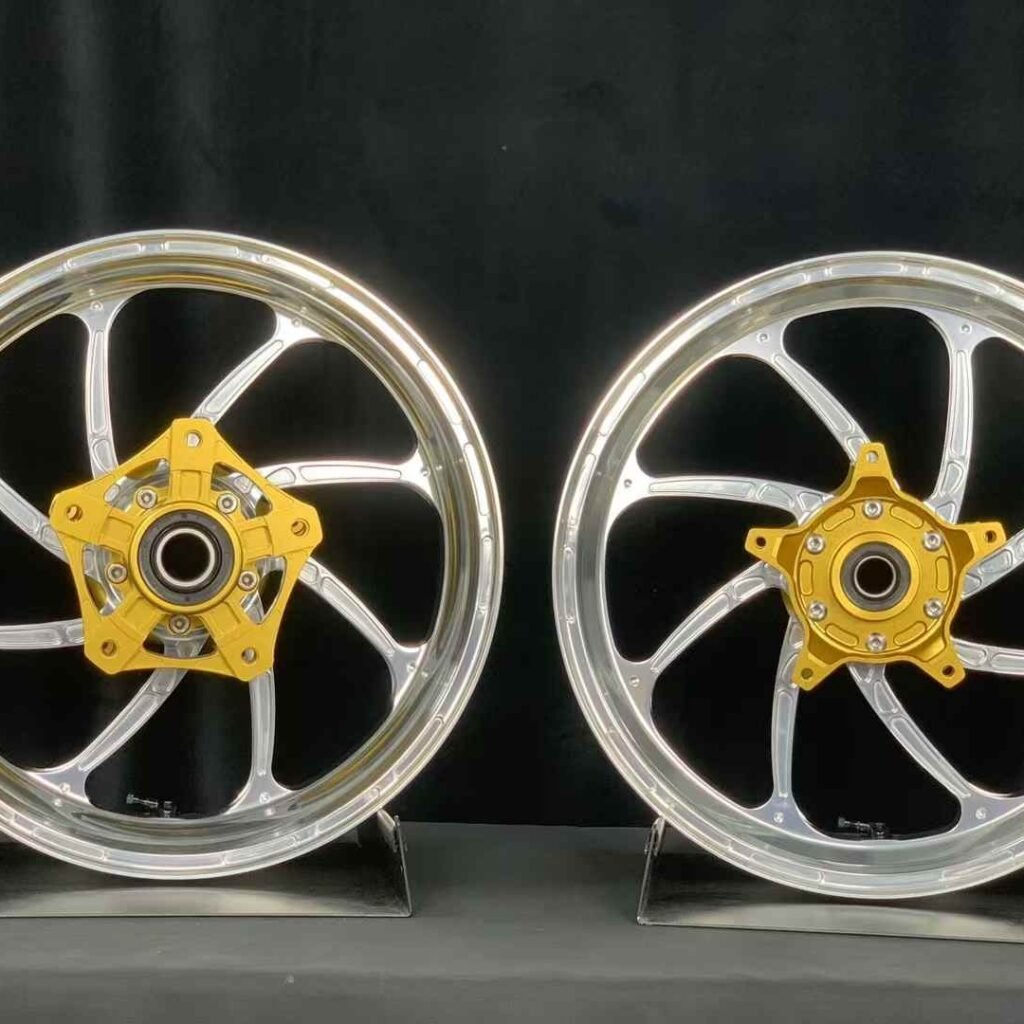 Front and rear monoblock forged wheels for Yamaha TMAX 560 with silver finish and gold hub