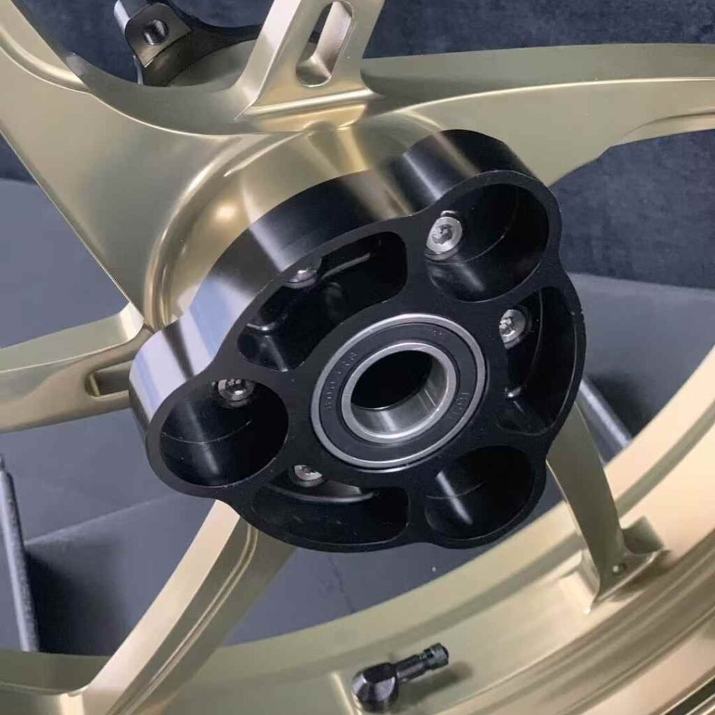 Black anodized hollow CNC hub for high-strength rear wheel fitment — Yamaha R3