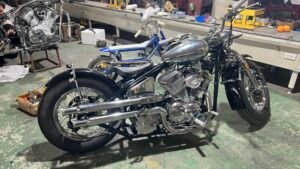 Custom motorcycle build workshop in China with premium custom wheels and complete motorcycle project display