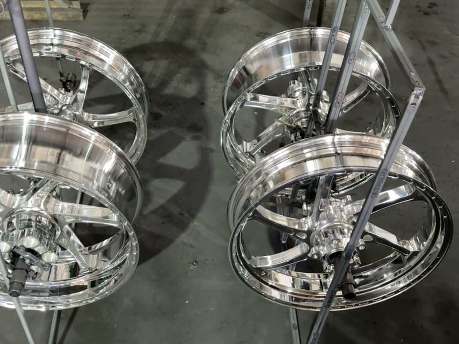 6061-T6 forged motorcycle wheel machined by FLEXIMOTO showing dense spoke design