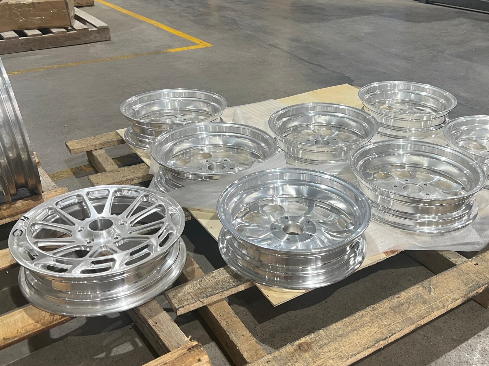 In-house forging and CNC machining of motorcycle wheels at the FLEXIMOTO factory in Chongqing